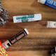 tubes of lip balm on a tabletop